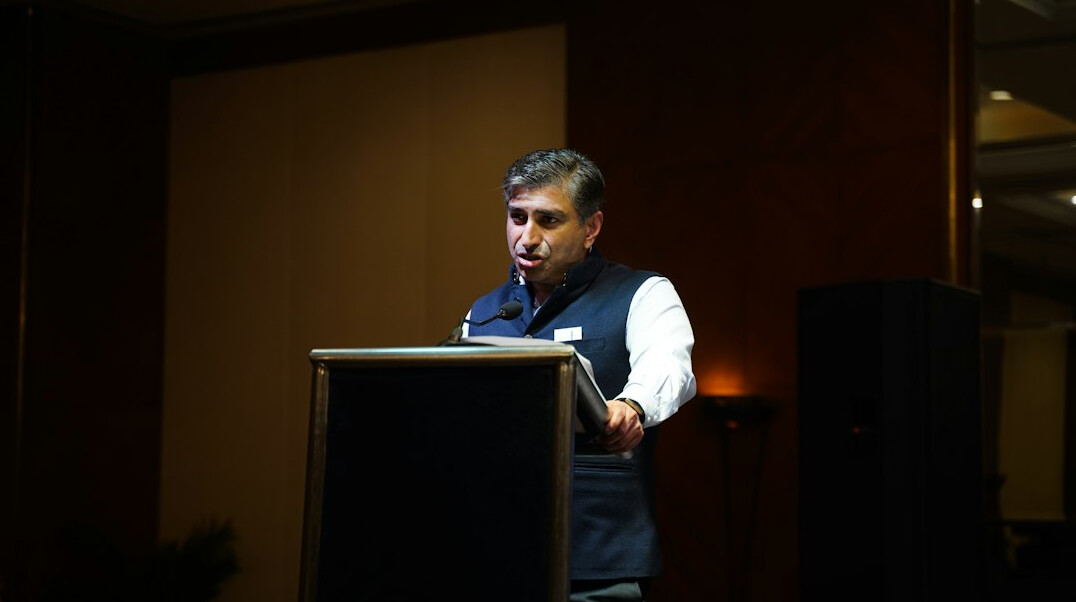 confident speaker on stage